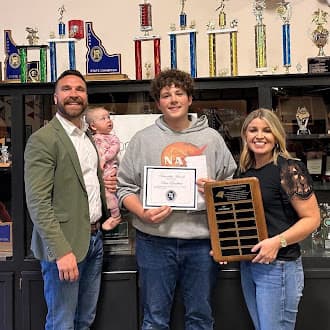 Barnabas Award presentation with family at Timberlake High School