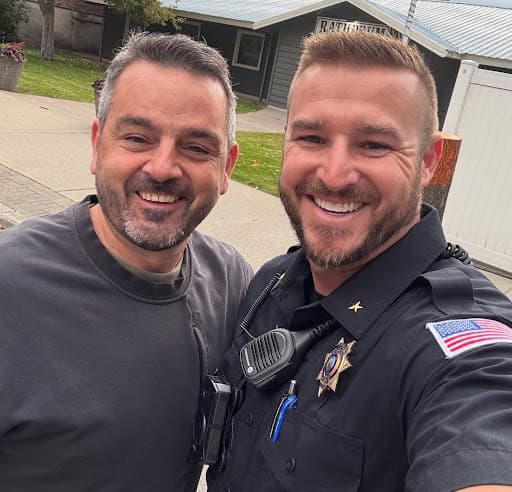 Redman team member with a Rathdrum police officer for First Responders Friday